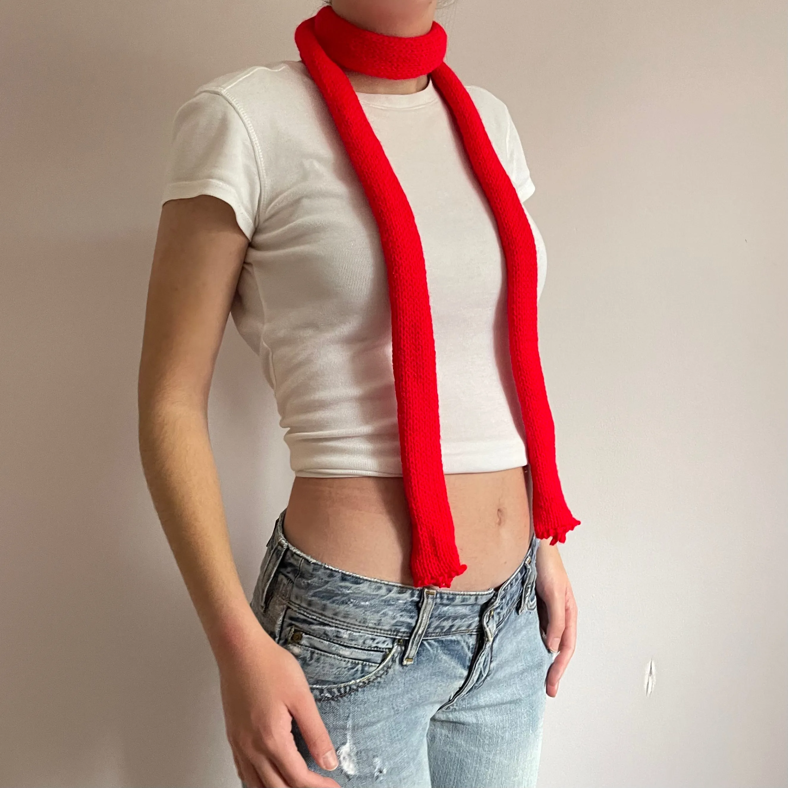 Handmade knitted skinny scarf in scarlet red