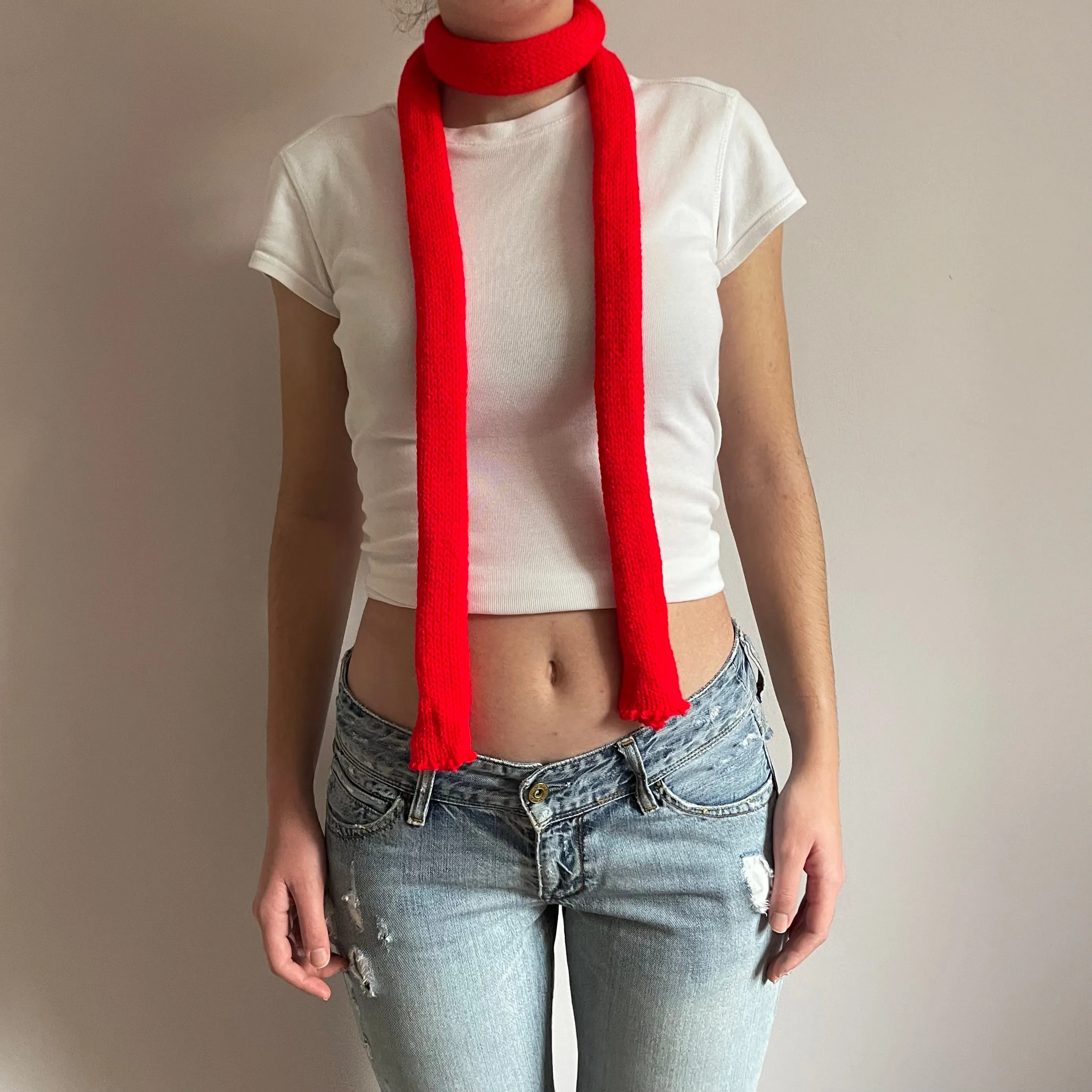 Handmade knitted skinny scarf in scarlet red