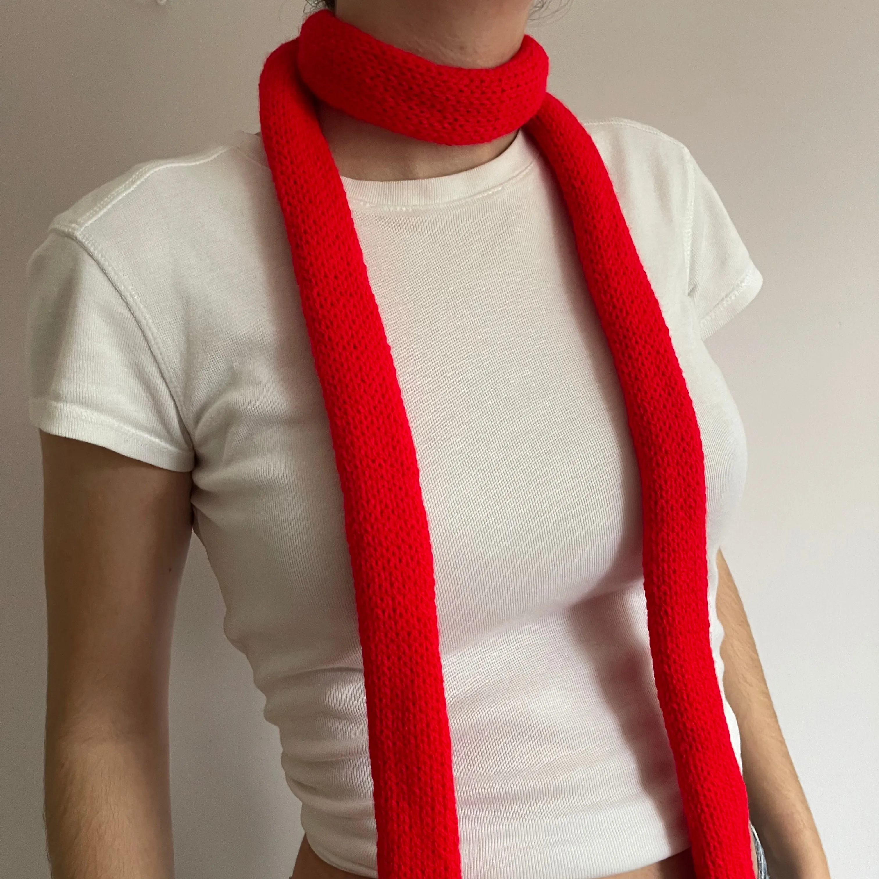 Handmade knitted skinny scarf in scarlet red